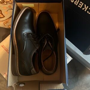 Dockers 10.5 medium, worn once for a wedding. EUC, see photos scratch on right